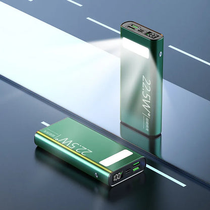 Alloy shell power bank in black, blue, green, or red colours showing LCD display and LED flashlight