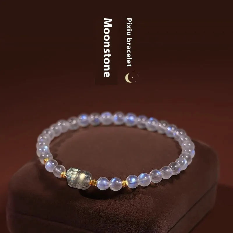 Women's moonstone bracelet, a fashion accessory in national style with a blue light trend featuring an animal or Zodiac motif crafted from natural moonstone with a ground and polished finish, supplied as a single piece.