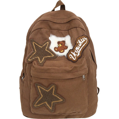 Brown canvas backpack with geometric patterns, ideal for female college students