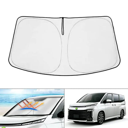 Silver tape sunshade cover fitted on a Toyota NOAH XOVY 90 series front windshield.