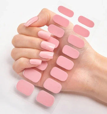Nail art stickers with alphabet letters in sealed packaging, showing 16 designs per pack