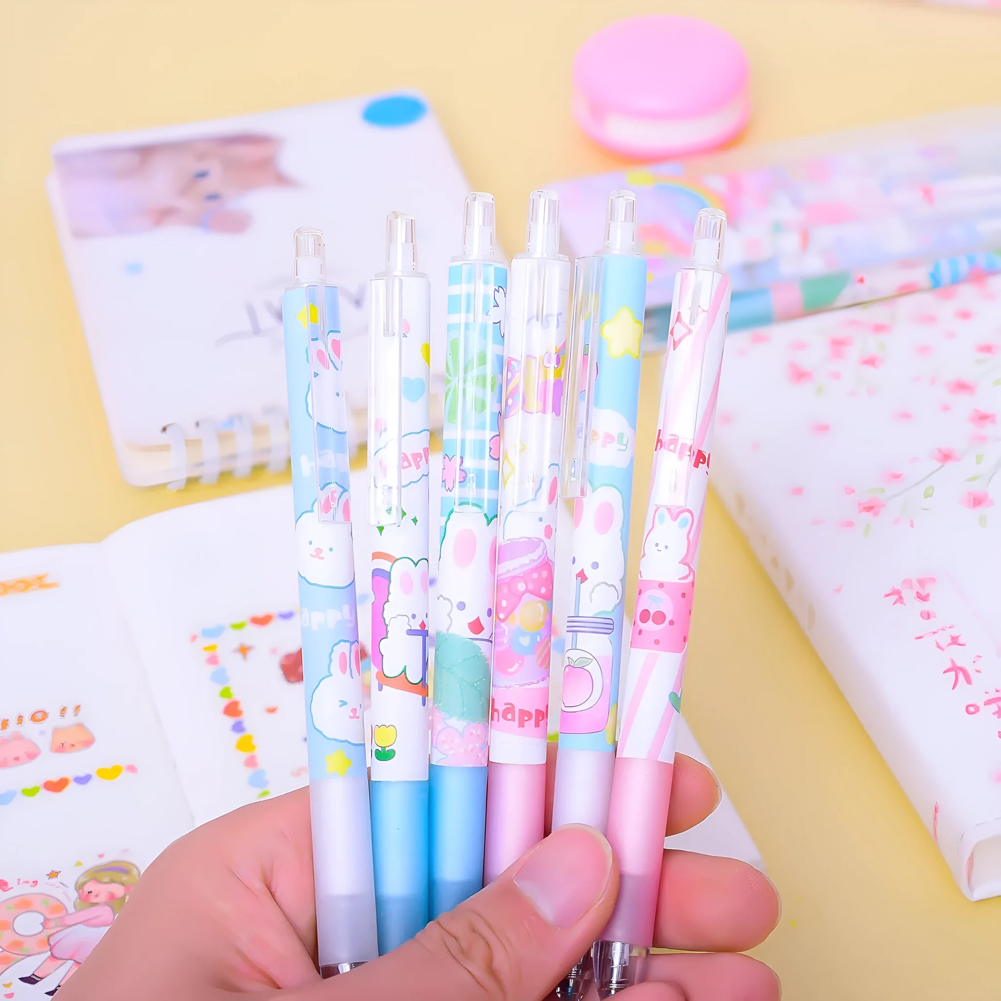 Six cartoon bunny design ballpoint pens with black ink and 0.5mm tips in packaging