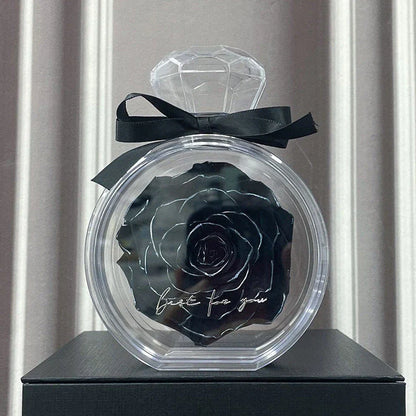 Preserved dried rose floral ornaments in a transparent display, available in various colors for home decor and special occasions