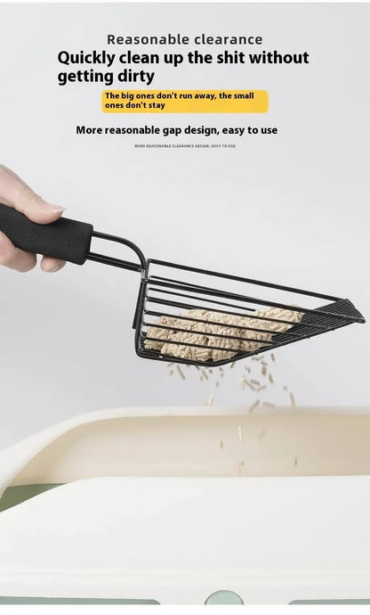 Black metal cat litter scoop with a 0.8cm gap between its tines on a white background.