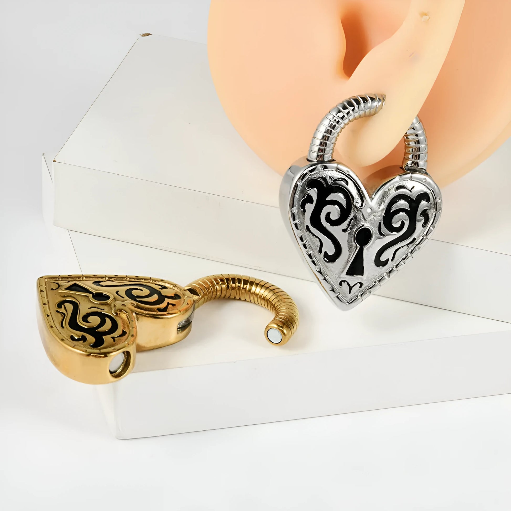 Women's stainless steel heart-shaped earrings with gold or steel colour electroplated finish.