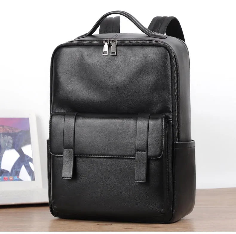 Men's large capacity leather computer backpack with curved back plate in black grain finish