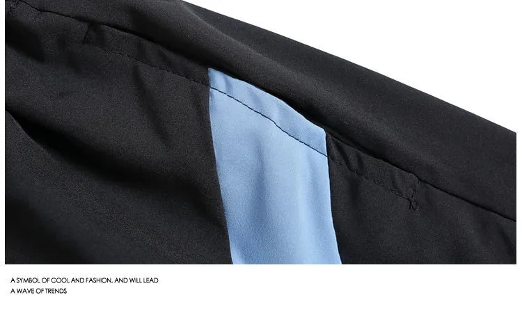Loose-fit black sports shorts with elastic waistband and straight-leg cut for athletic wear