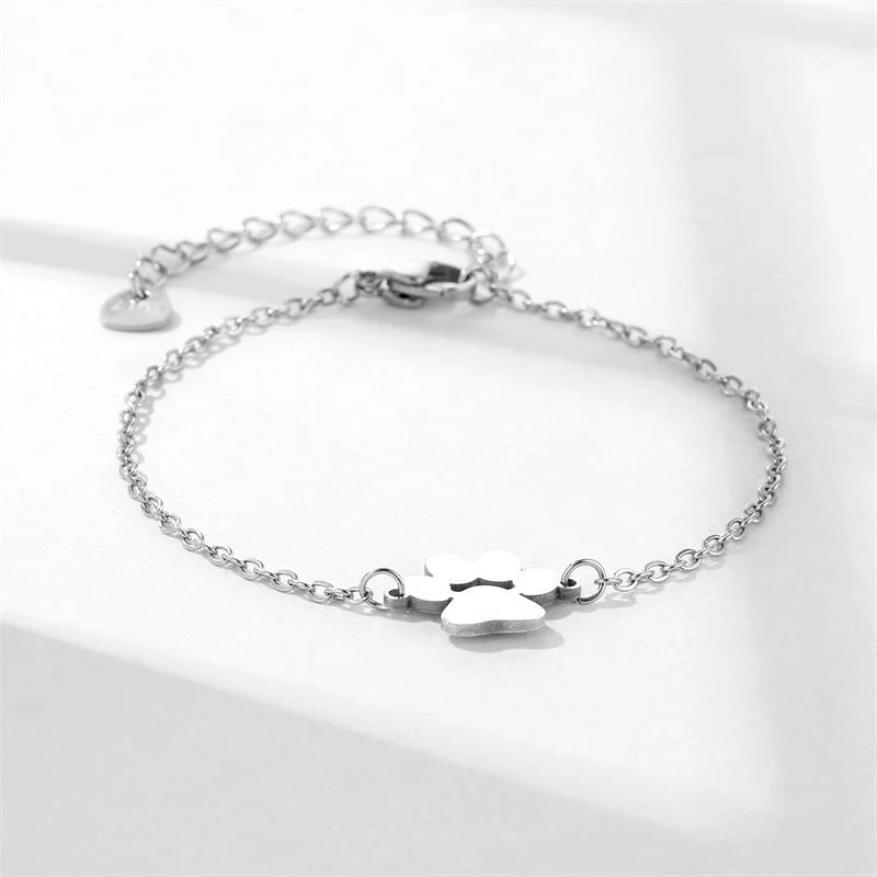 Stainless steel bracelet with a polished dog paw design, a stylish accessory for pet lovers