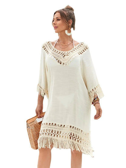 Hand-crocheted apricot beach dress for women on a beach