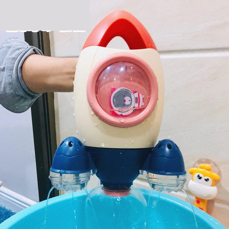 Dinosaur-shaped baby bath toy with manual water spray feature in bright colours