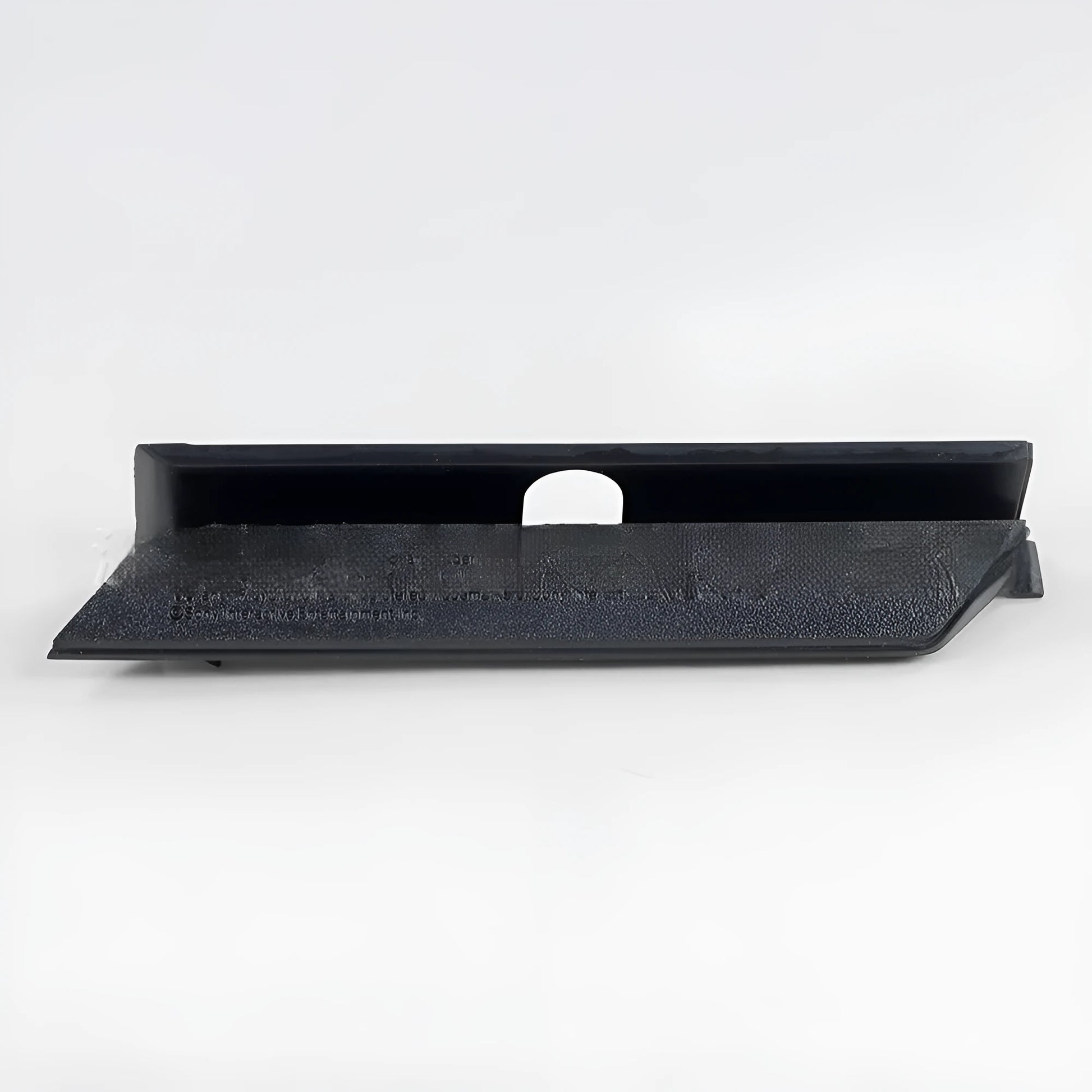 Black and white plastic hard drive PCB cover for 3.5-inch drives, shown from above.