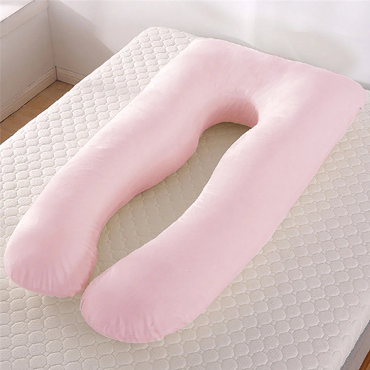 Premium U-shaped pregnancy pillow with pure cotton exterior and polyester fiber filling, designed to provide soothing support and refreshing coolness for expectant mothers.