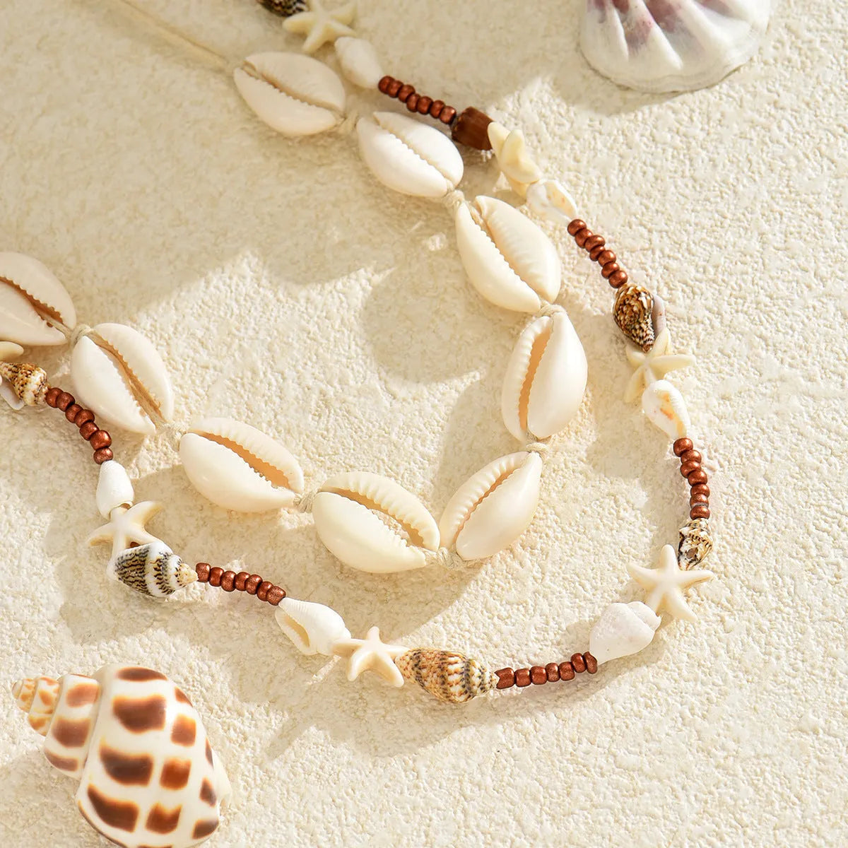 Handmade bohemian shell pendant necklace with geometric shape in X1900 colour on regular chain