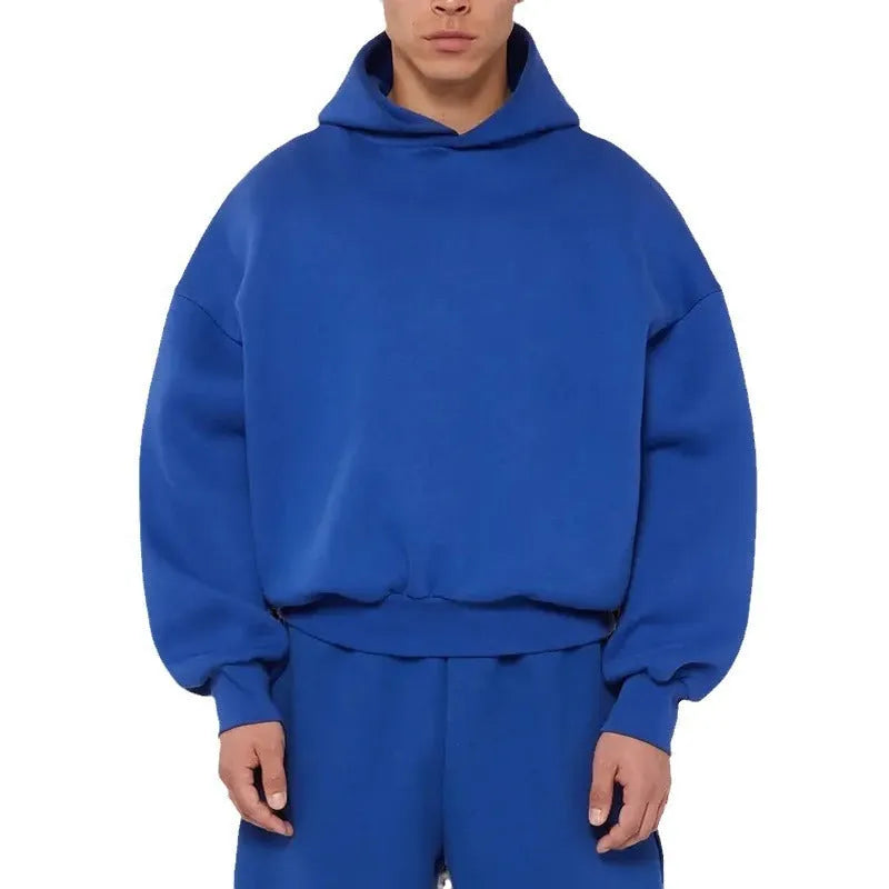 Men's grey fleece-lined cotton pullover hoodie with a wool lining and long sleeves