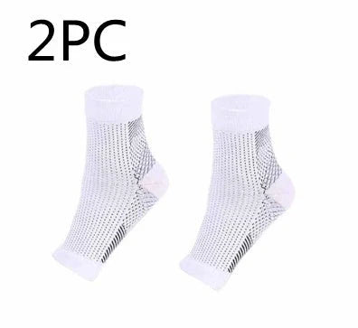 Anti-fatigue compression foot sleeve in black, red, or white, featuring moisture-wicking fabric and a heel hole for breathability.