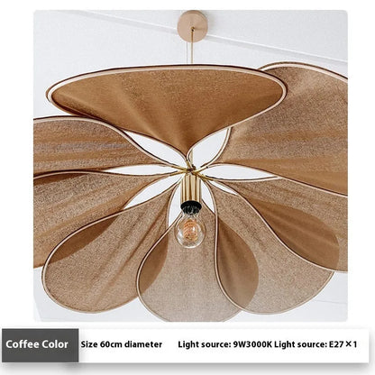 A cloth-craft hanging lamp in log wind Bohemian style, showing fabric texture and soft light diffusion.