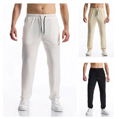 Silky rib fabric baggy straight-leg casual trousers with an elastic drawstring waist in khaki colour.
