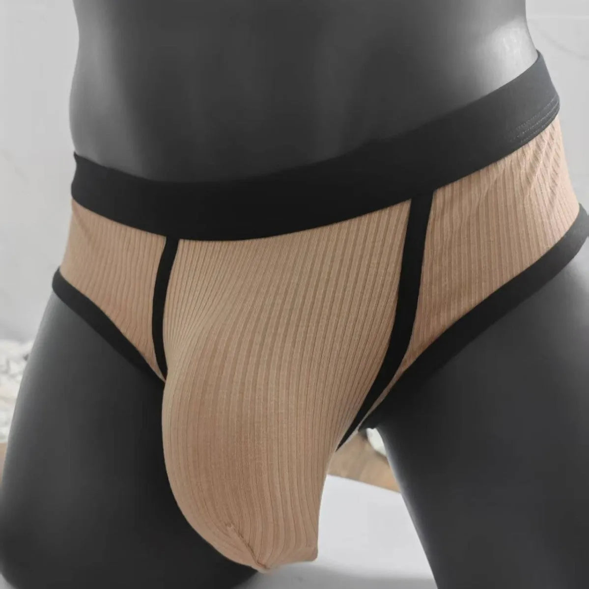 Men's triangle U-shaped bag underwear in viscose fabric showing solid colour options