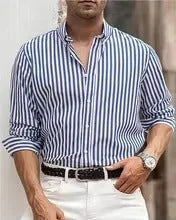 Man modelling a khaki and white striped loose-fit long sleeve casual button shirt.
