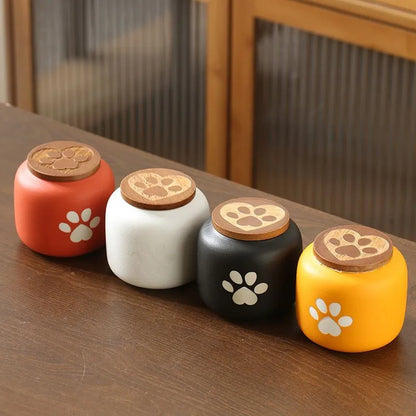 Ceramic pet funeral urn with foot print design in choice of colours and 180ml or 500ml sizes