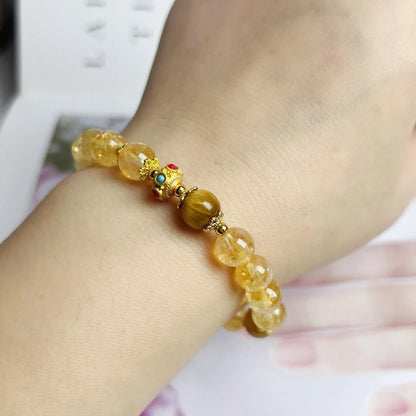 Citrine crystal bracelet with floral tassel design for women, handcrafted beadwork