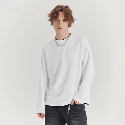 Men's loose long-sleeved cotton blend t-shirt in black, round neck, casual style.