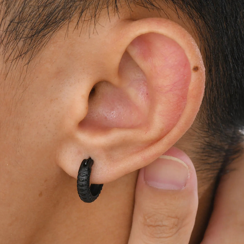 Stainless steel snake pattern earrings with a black or gold finish, offering a durable and lightweight accessory for everyday wear, featuring a simple design suitable for various styles.