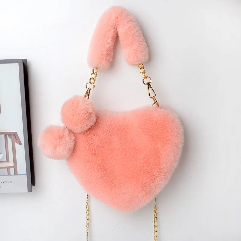 Plush heart-shaped women's handbag in medium size with removable shoulder strap
