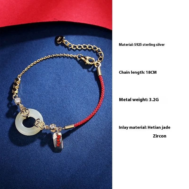 Chinese style sterling silver and Hetian jade jewellery set with bracelet, necklace, and earrings.