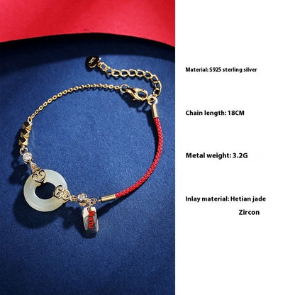 Chinese style sterling silver and Hetian jade jewellery set with bracelet, necklace, and earrings.