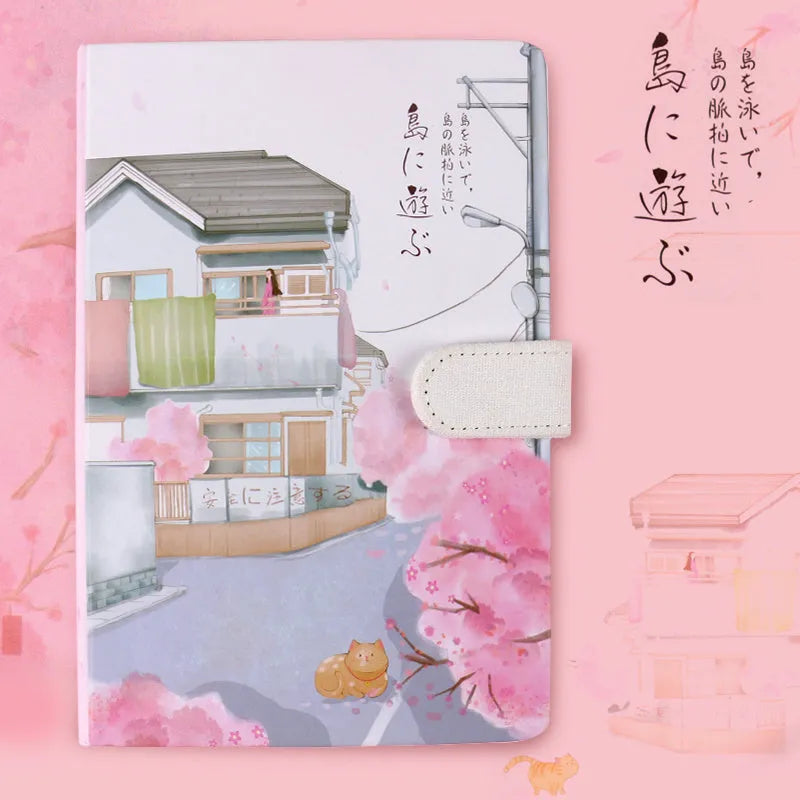 A5 wire-bound retro style notebook with colourful illustrated cover, shown with included pen.
