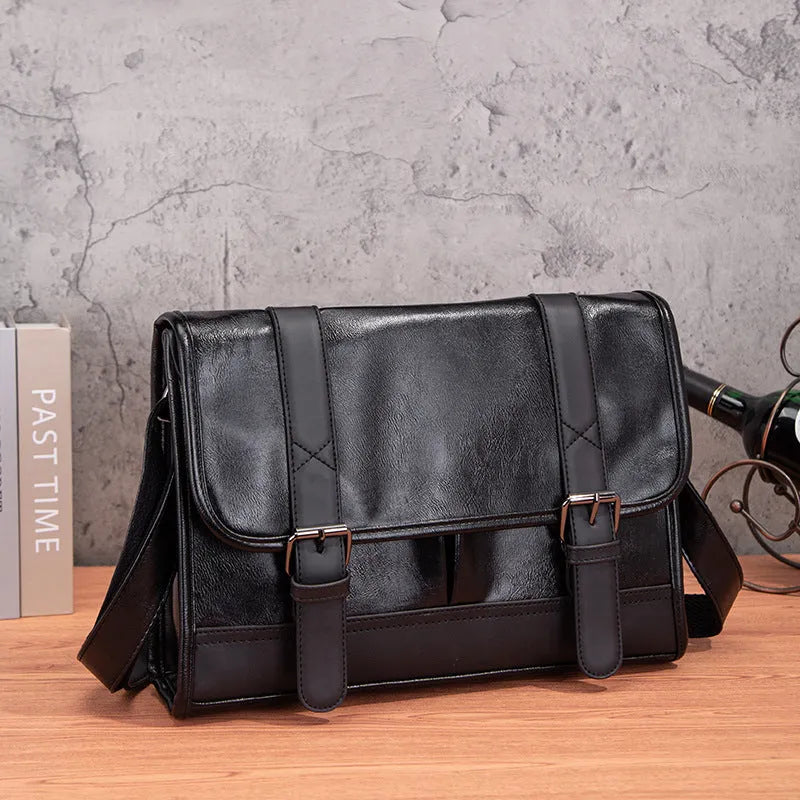 Commuter backpack for men in Korean style, anti-theft black backpack made from PU leather material with polyester lining and contrast stitching detail for urban travel