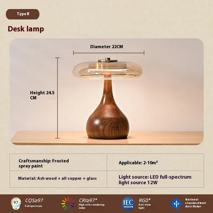 Solid wood Japanese retro style bedside lamp with a cognac-coloured hood on an ash wood base.
