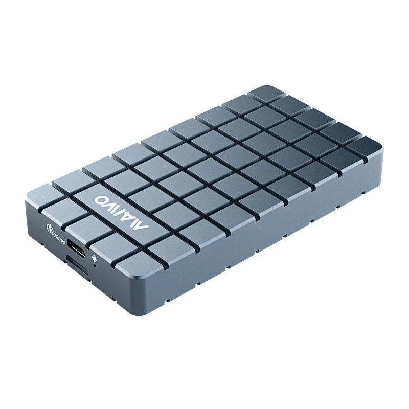 Slim aluminium USB4 hard disk enclosure for M.2 NVMe SSDs, shown next to a laptop.