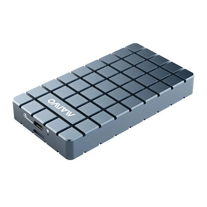 Slim aluminium USB4 hard disk enclosure for M.2 NVMe SSDs, shown next to a laptop.