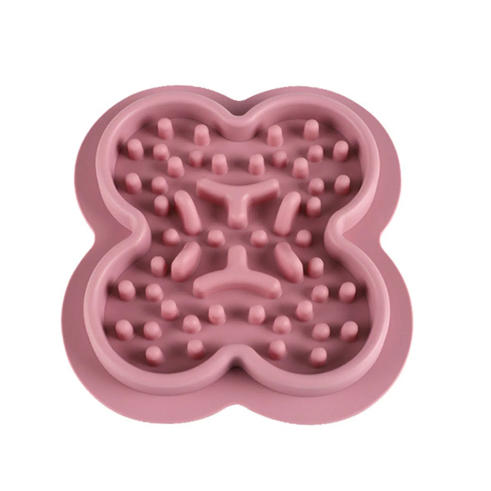 A raised silicone pet licking pad placed on a floor, showing its textured surface and non-slip base.