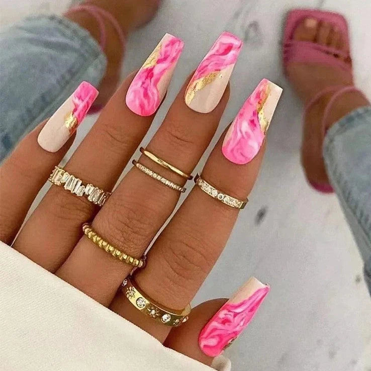 One Second Wearable Manicure set with 24 nail art pieces in rose, tulip, leopard print, and XINGX patterns