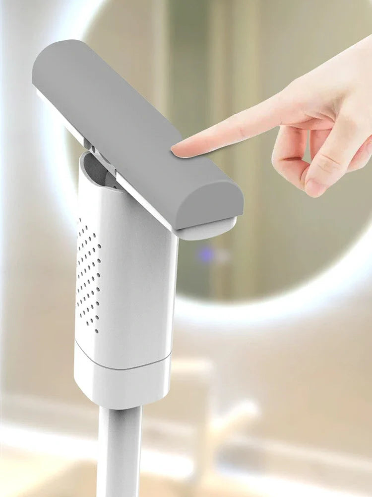 Handheld mini mop with 15cm rubber cotton head and folding squeeze mechanism for compact storage
