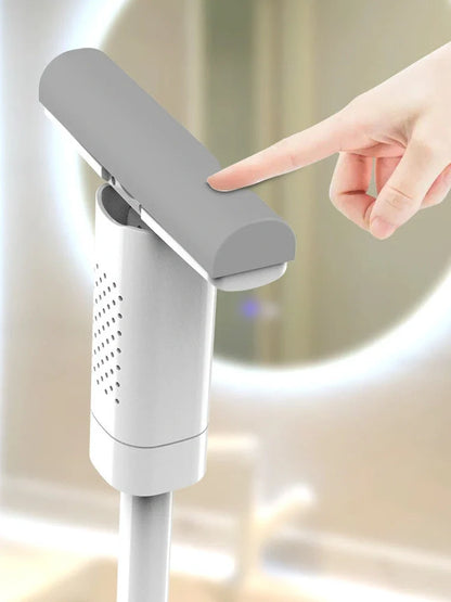 Handheld mini mop with 15cm rubber cotton head and folding squeeze mechanism for compact storage