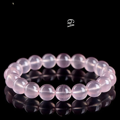 Natural starlight crystal bracelet with polished pink beads in multiple size options