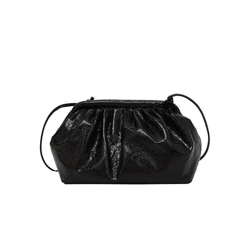 Simple Hair Clip crossbody bag in rose red showing shell shape, front zipper, and adjustable shoulder strap.