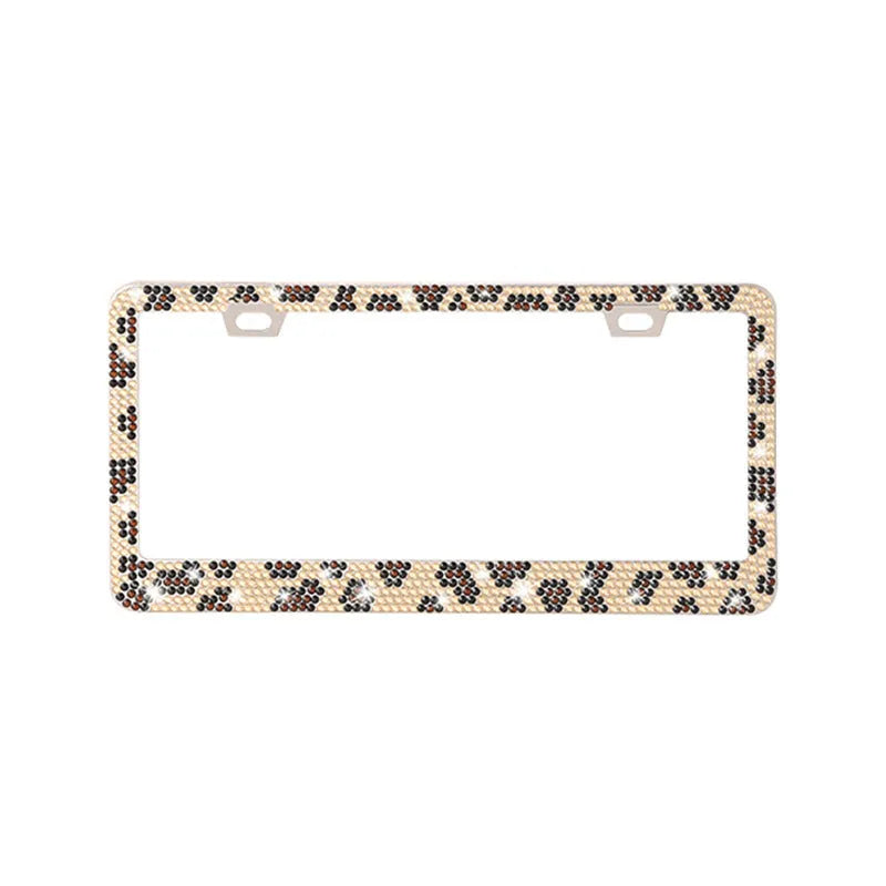 Stainless steel license plate frame with square holes for applying coloured acrylic diamond crystals.