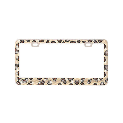Stainless steel license plate frame with square holes for applying coloured acrylic diamond crystals.