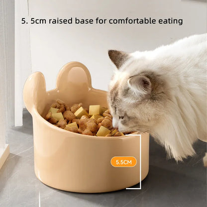 Blush Critter ceramic pet bowls in white rabbit and brown bear designs, showing neck protection rim.