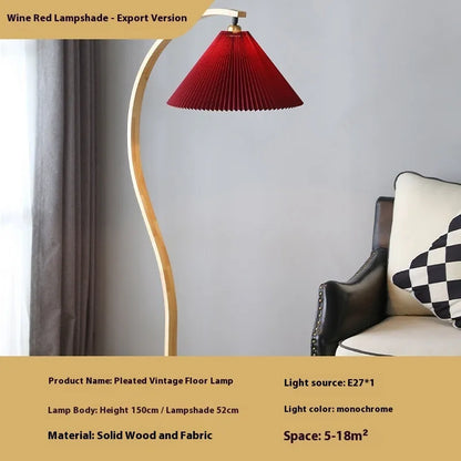 Vertical table lamp with retro-style log lampshade in white or wine red colour options