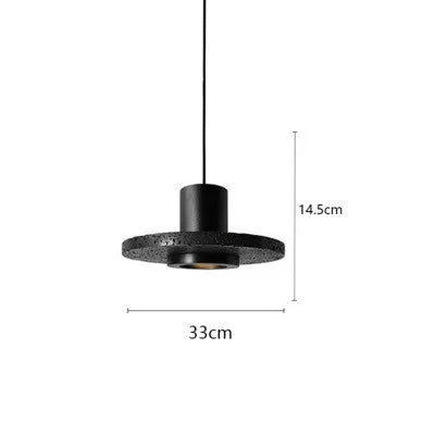 Industrial style iron chandelier with an adjustable hanging cord above a dining table.
