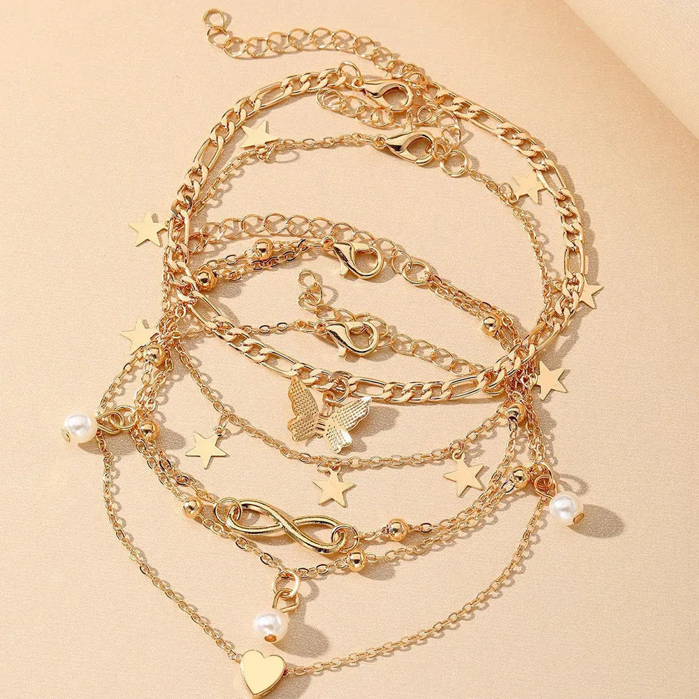 Butterfly love design four-piece alloy anklet set for women with pearl heart details
