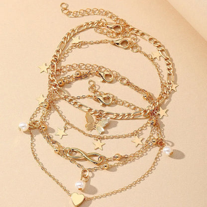 Butterfly love design four-piece alloy anklet set for women with pearl heart details