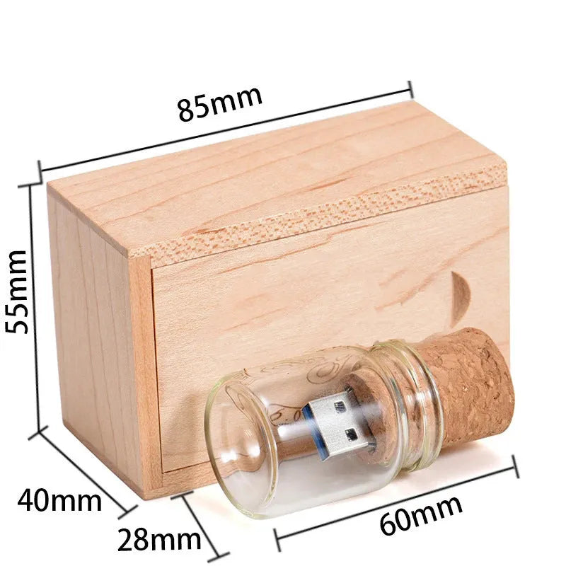 Chocolate brown wooden USB flash drive shaped like a drift bottle with custom engraved lettering on the side