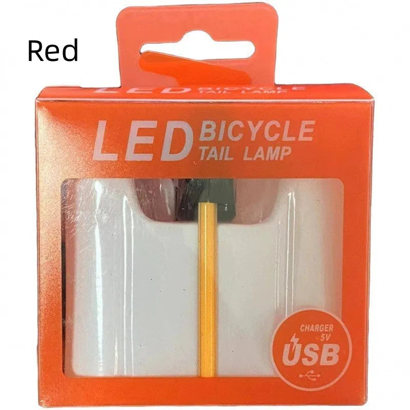 Waterproof USB rechargeable bicycle tail light in blue, pink, red, white, or yellow colours